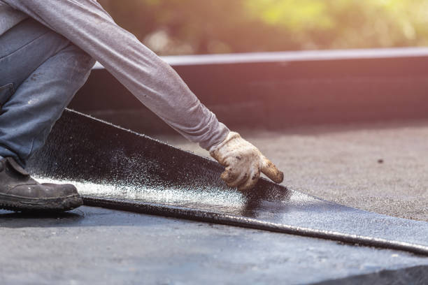 Professional Waterproofing technician working in Eldorado, IL